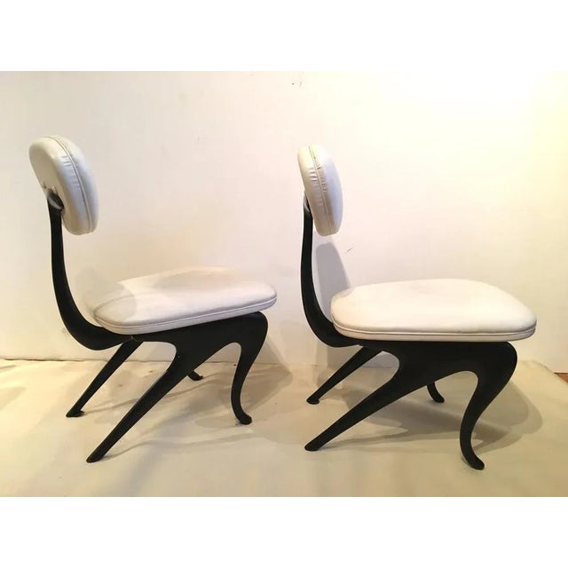 These extraordinary side chairs were created and cast in a limited edition, by jordan mozer for the hudson club, in...
