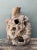 Carved naturally by growth and weather, this vintage organic wood sculpture features a heavily textured knot formation...