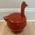 The color, proportions and especially the cute lighthearted gooseneck make this one of our favorite decor items. The lid...