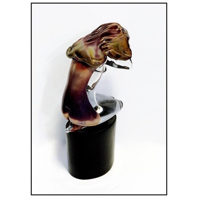 The artwork here, "Kneeling Nude", is a wonderful depiction of a woman holding her hair back from her face, that is...