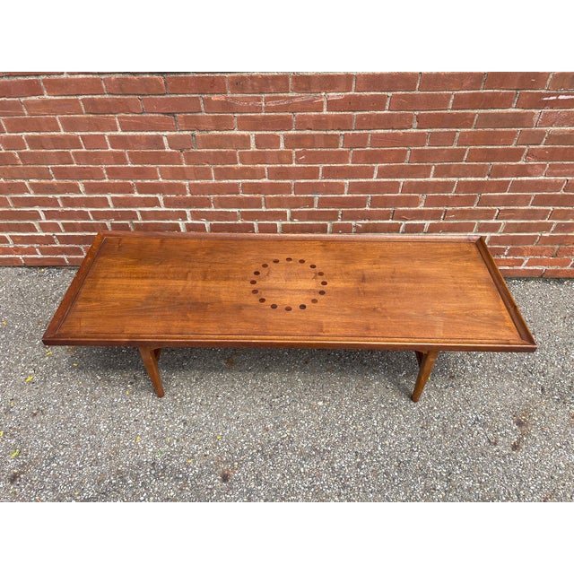 Designed by Kipp Stewart and Stewart MacDougall for Drexel’s Declaration collection, this walnut coffee table is a...