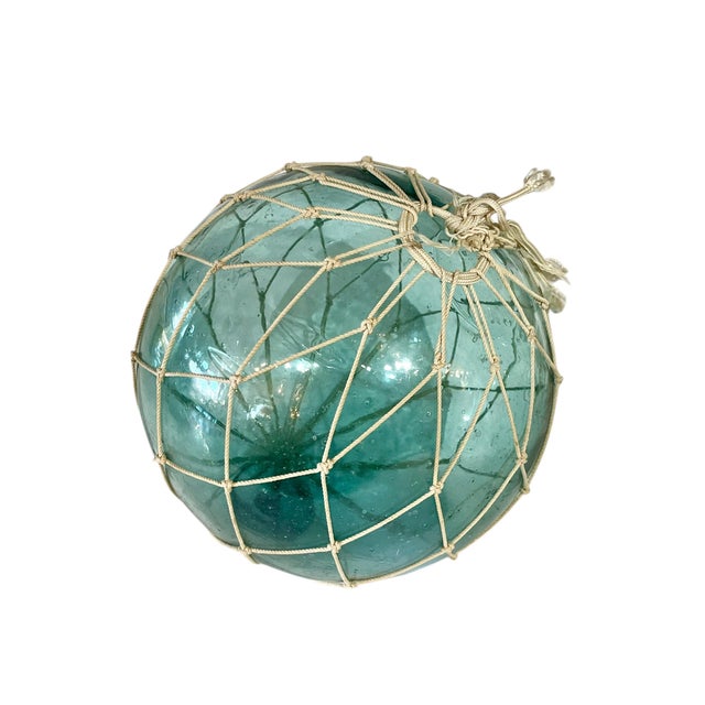 Vintage handblown Japanese glass fishing float. Beautiful turquoise blue glass.