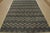 This contemporary geometric Moroccan Chevron rug is hand-knotted with an all-wool high-low pile on a cotton foundation....