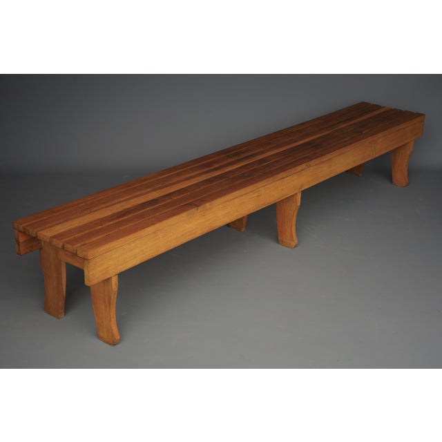 A very long slatted bench made from solid oak wood. This bench would make a superb addition to any stylish interior. It is...