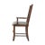 An antiqued wood dining armchair, the arched serpentine ladder back above an upholstered drop-in seat, on sabre legs...