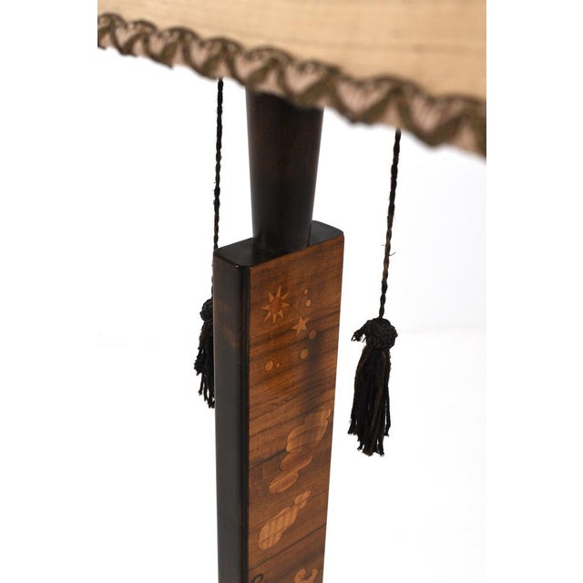 Swedish Modern floor lamp by Mjölby Intarsia, Sweden, circa 1930s. An exceptional example showcasing the intricate wood...