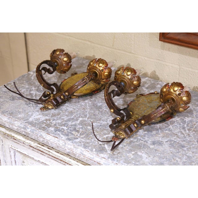 Decorate a hallway, dining room, powder room, or library with this striking pair of mid-century American Renaissance...