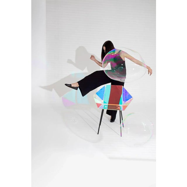 The transparent Prismania chair is both an artefact and a chair. At one point you can barely see it, take another step and...