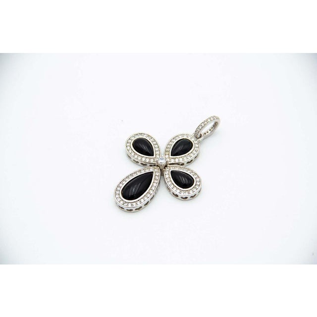 Silver Medal in the Shape of Cross with Four Drops, in Good conditions. Designed 1980 to 1989