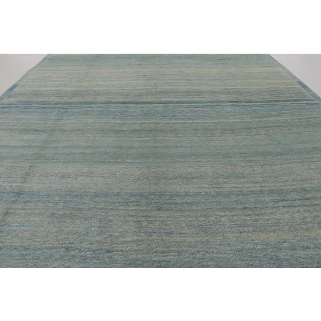 Handwoven in high-quality wool, this 20x13 oversized rug is from a bold new line of contemporary rugs by Rug & Kilim. This...