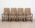 Made in France in the twentieth century, this set of four Louis XIII style armchairs has high backs in the manner of the...