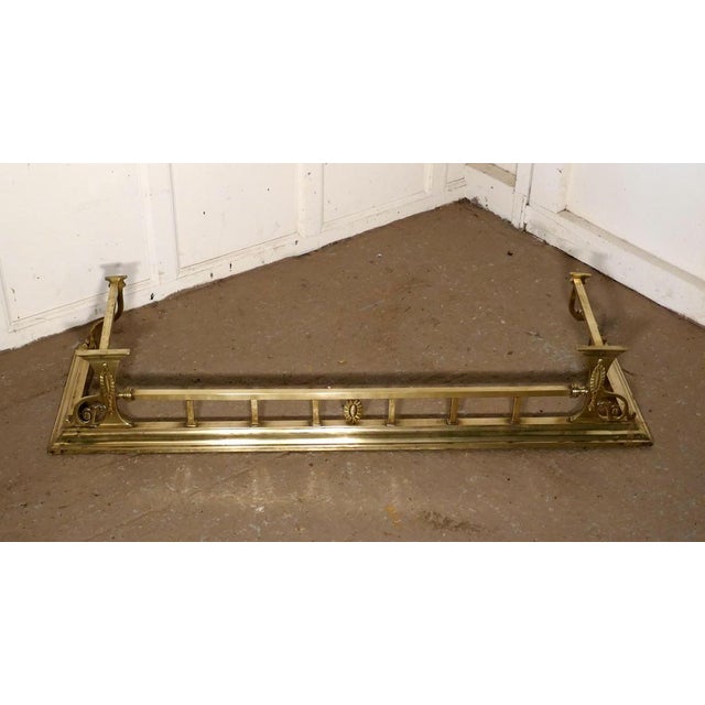 Large Victorian Art Nouveau brass fender. This is a beautifully designed Victorian brass fender it has Art Nouveau...