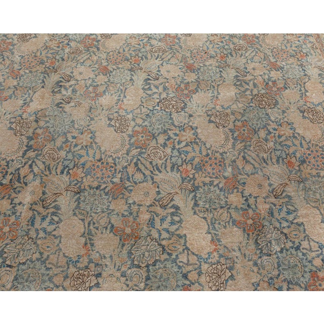 This early 20th-century Northwest Persian Tabriz antique carpet was made in Tabriz, the capital of the northwestern...