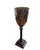 This versatile piece diffuses candlelight warmly and can double as a floral vase or accent piece. The rich walnut wood...