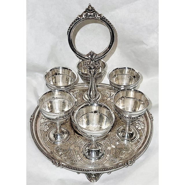 Your eggs just as you like them, madame. What a cool 19c Victorian silverplate egg server, 6 removable egg cups firmly...