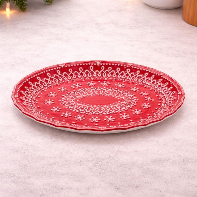 Add a festive pop of color to your holiday table with this Red Embossed Snowflake Ceramic Platter Set. Featuring an...