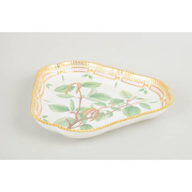 Royal Copenhagen Flora Danica triangular dish, 1963. Elegant dish from the iconic Flora Danica service, hand-painted with...