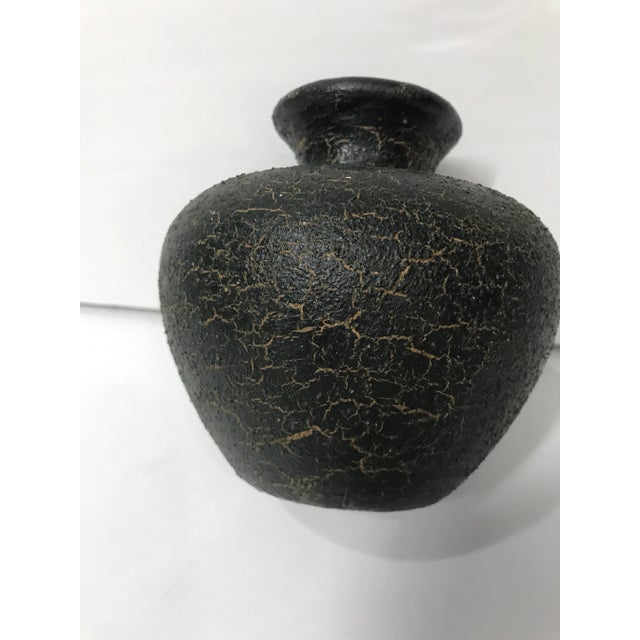 This is an adorable vintage vase with honu (turtles) that was handmade in Hawaii. It is made of black lava and has two...