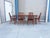 ✨ Danish Modern Teak Extension Dining Set ✨ This exceptional Danish Modern dining set, designed and manufactured in...