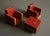 Two miniature club chairs and a side table (each piece carrying company labels and burnished markings) Table: 12 x 11.7 x...