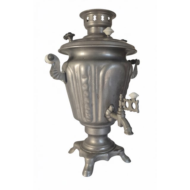 These Russian samovars are made of nickel-plated brass. They are used traditionally to boil water for tea. They are mid-...