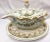 Pretty lidded ceramic soup tureen from the mid 20th century. It has a hand painted floral design in shades of yellow,...