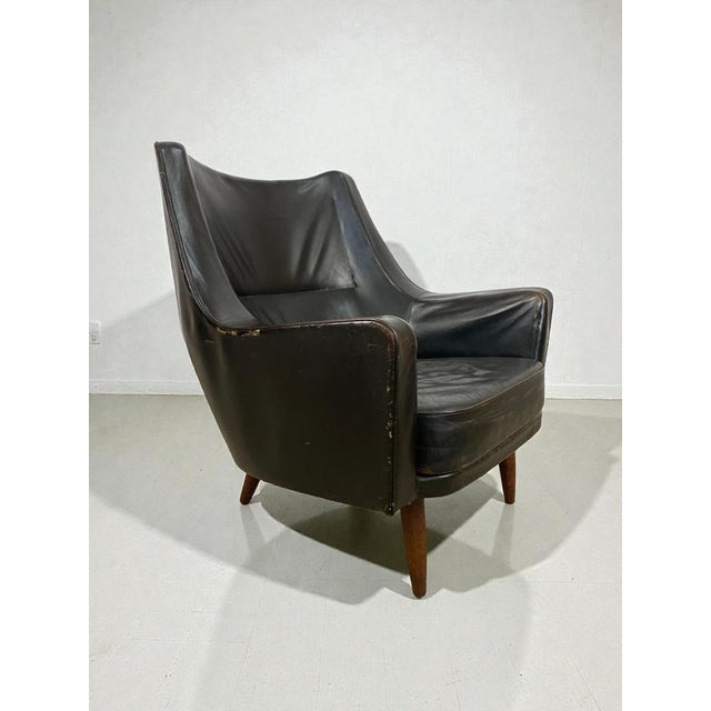 Elegant pair of mid-century modern lounge chairs attr. Ib Kofod-Larsen, one of Denmark’s most influential furniture...