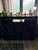 This impressive transitional sideboard offers a sophisticated blend of traditional mahogany veneers and rustic industrial...