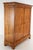 Original Biedermeier wardrobe in walnut veneer with a large cornice, beautiful framed panels on the front, two doors in...