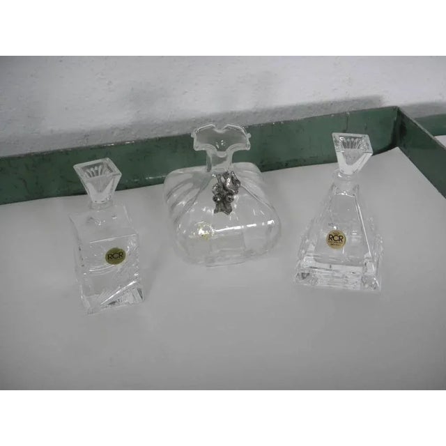 Pyramidal in shape with cap produced by RCR 8x8 h14 cm. Square shape produced by RCR 5x5 h13 cm. Vasetto with in a pelt...