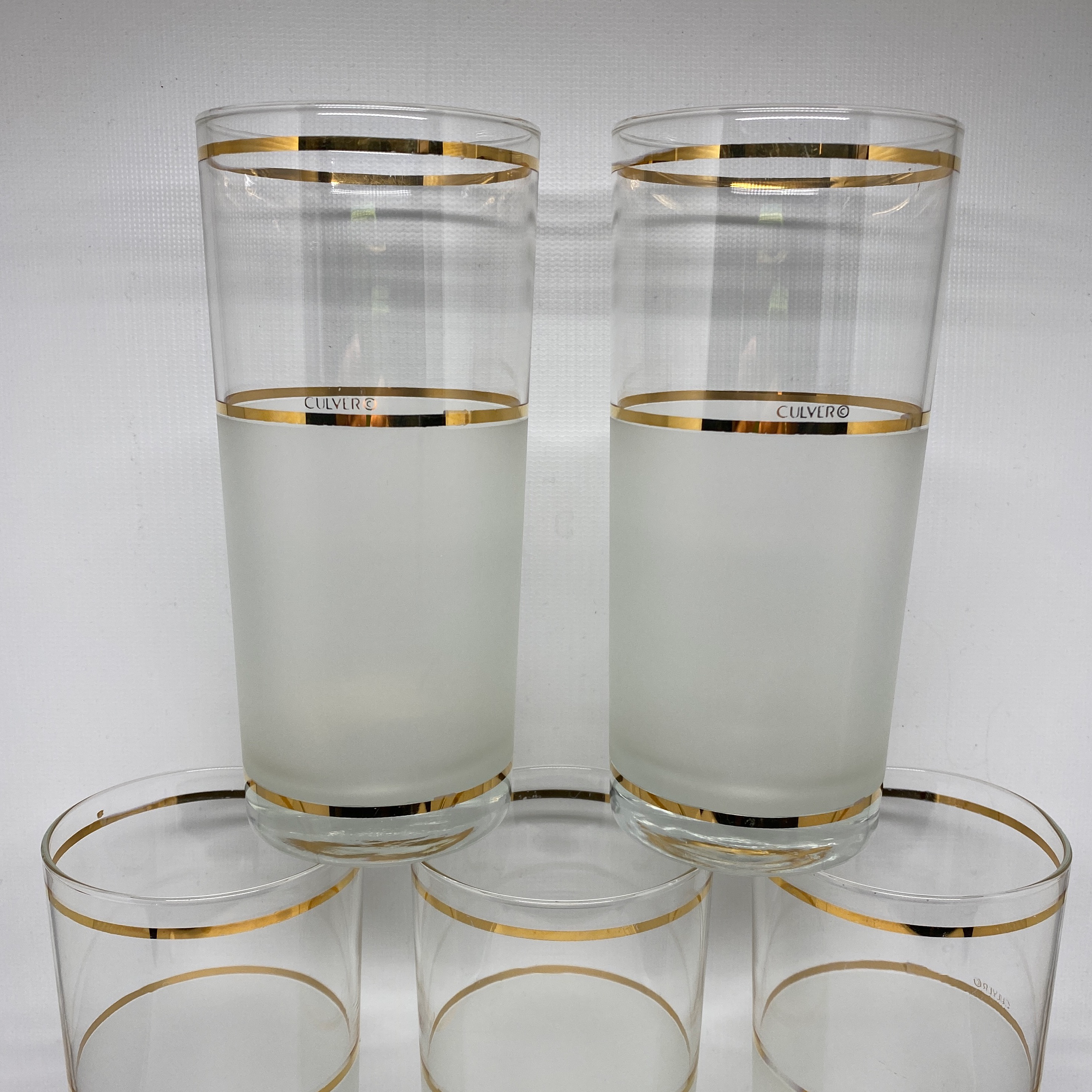 clear glasses with gold trim