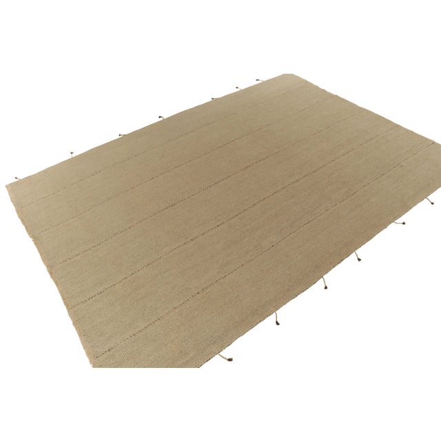 Handwoven in wool, a 10x14 Kilim from a remarkable new line of contemporary flatweaves by Rug & Kilim. On the Design:...