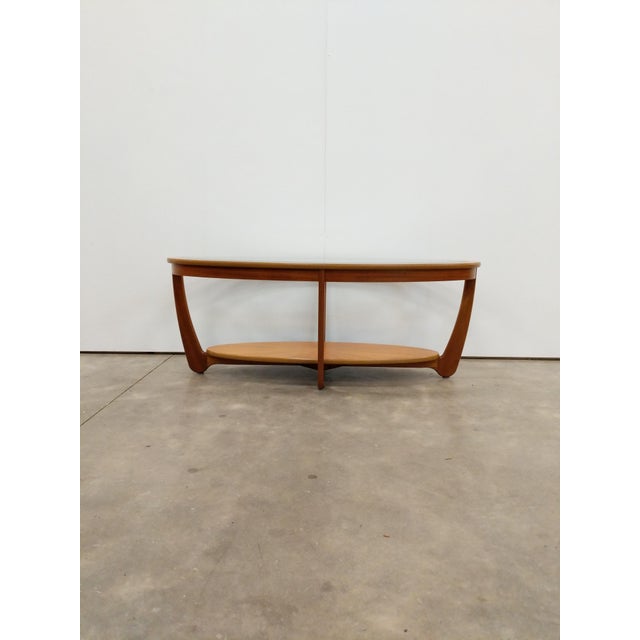 Authentic vintage mid century modern teak coffee table. By Nathan Furniture (unmarked). This piece is in excellent...
