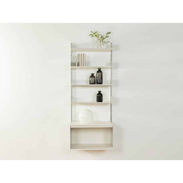 Modular shelving system 606 by dieter rams for vitsœ from the 1960s. High-quality construction consisting of two aluminum...