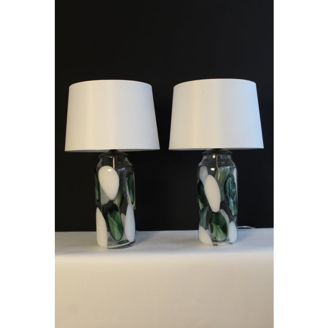 Beautiful pair of Seguso influence lamps. Transparent with a blend of abstract luminescence designs. The combination that...
