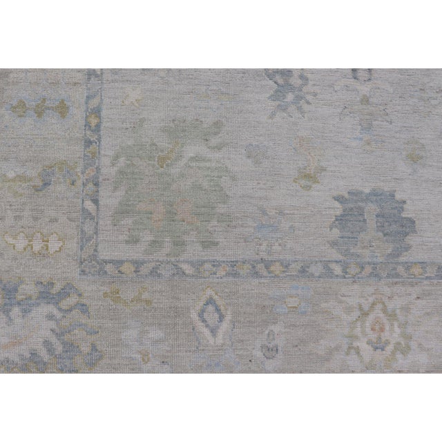 Textile Modern Tribal Oushak With a Cream Border and Light Gray-Blue Background For Sale - Image 7 of 13