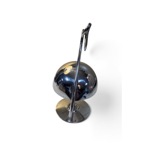 A charming vintage silver-plated cocktail pick holder by Napier, designed in the wonderfully stylized form of a swan....