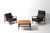 Pair of mid-century teak lounge chairs by the Belgian firm Beka, 1960s. The frame stands out for its sculpted, wing-like...
