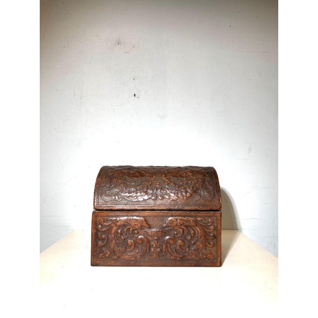 Beautiful early 19th century antique leather chest featuring a distinctive domed lid and richly embossed decorative...