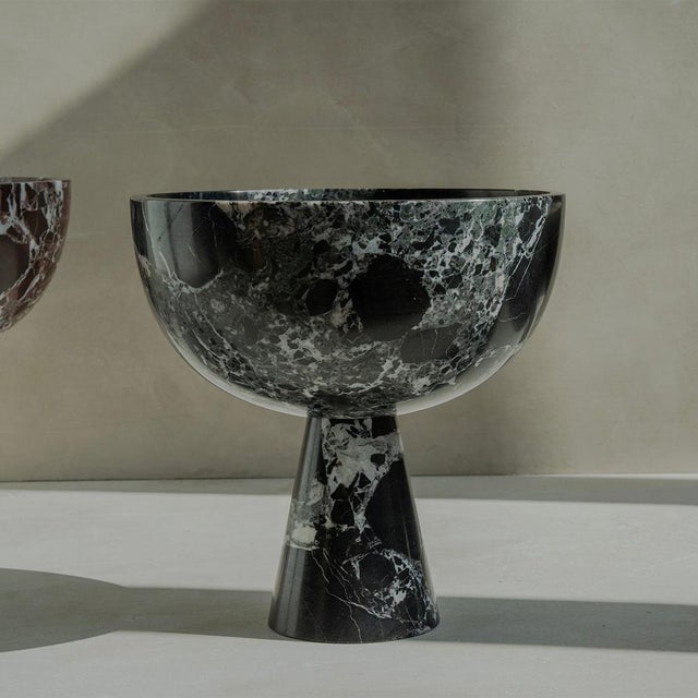 Introducing our stunning Black Green Marble Pedestal Bowl , a captivating fusion of style and utility. Crafted from...