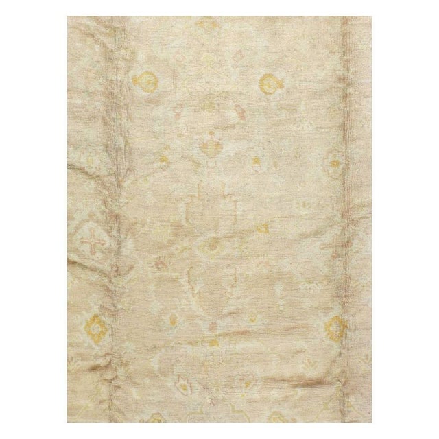 An antique Turkish Oushak room size carpet handmade during the early 20th century. Measures: 10' 3" x 12' 10" Turkish Rugs...