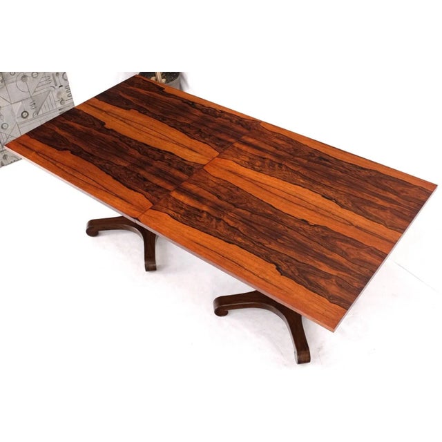 Two part rosewood two pedestals dining table game table mint. Dining table consisting of two came cafe tables that look...