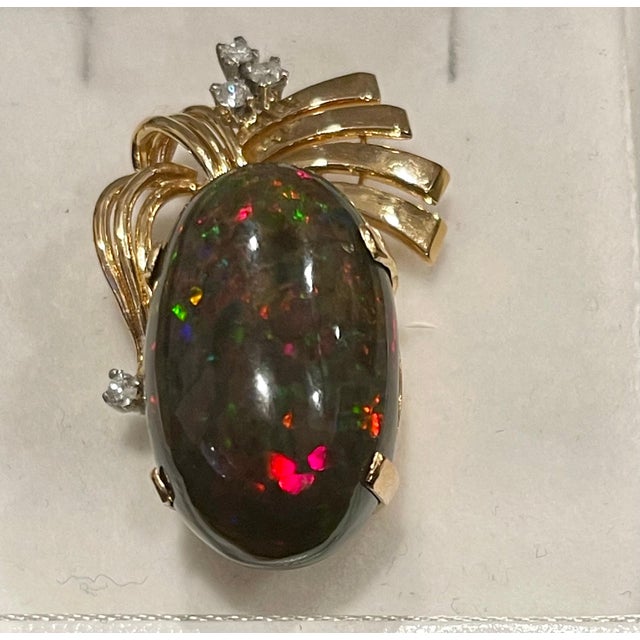 2020s 30 Carat Oval Ethiopian Black Opal Pendant 18 Karat Yellow Gold For Sale - Image 5 of 8