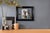This artwork features a playful composition with a jester card, an antique key, and vibrant marbles, creating a sense of...