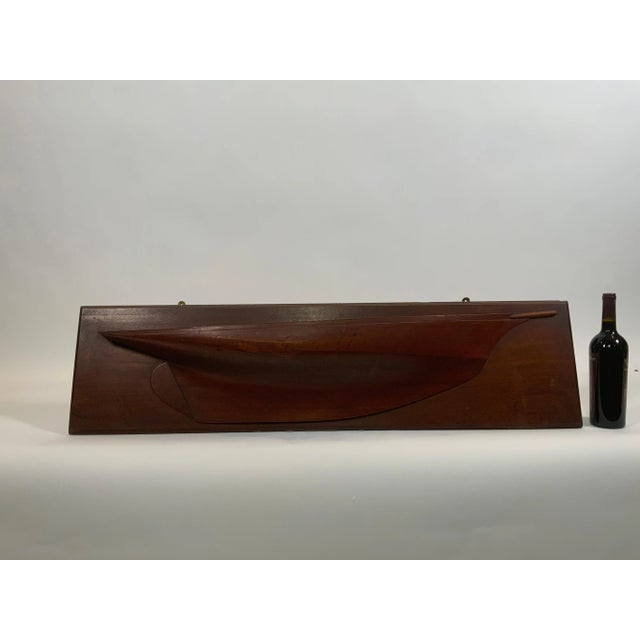 Exceptional half model of an American sailing yacht. Beautifully carved hull with a rich dark patina. Large scale, quite...