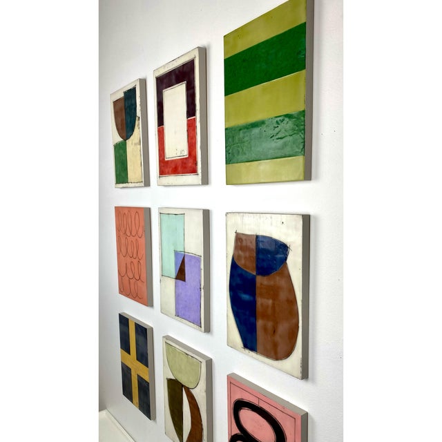 Nine 12x9 cradled wood panels make up this encaustic mixed media art piece. In the photo they are hanging spaced...