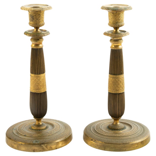 Pair of 19th-Century French Chased Gilt Bronze Candlesticks, France, Restoration period (circa 1815–1830). Each...