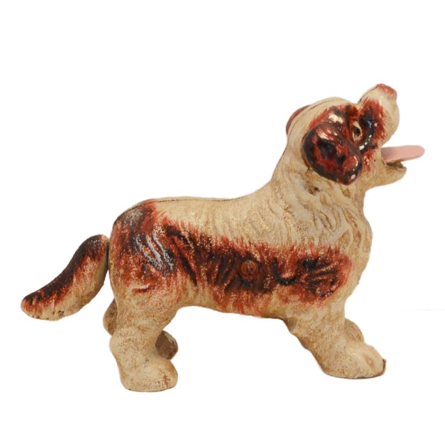 Capture the delightful personality of a Cavalier King Charles puppy with this heavy-duty mechanical coin bank. Based on a...