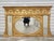 A stunning early 19th century Regency giltwood and gesso overmantel mirror, featuring a center oval plate flanked by two...