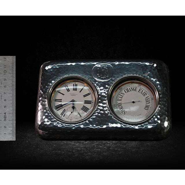 Distinguished Thornhill London clock and barometer set in sterling silver with a hammered finish. Enameled dials with...